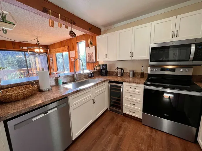 Fully stocked kitchen with upgraded appliances.