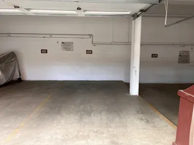 View of designated garage spot for this unit, #108.  Max clearance for the garage is 80" at the garage opening.