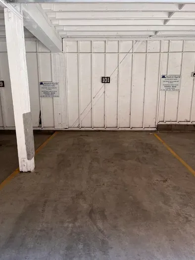 Designated garage parking spot.  
Max clearance height - 80"
Depth - 232"
Width - 104"