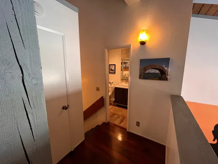 Loft bathroom and stairs to studio below