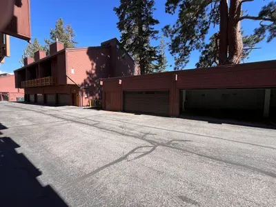 Designated garage for our unit (1 spot). Our spot is behind the garage door on the right side of the picture.  A 2nd parking spot is available in any outside parking spots on a first come 1st serve basis.