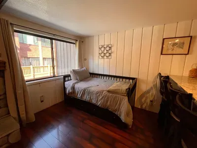 Pullout Bed **NOTE* Pictured as a double.  There is a 2nd double mattress trundle that slides out from underneith.  It can be used as two double beds or raised and pushed together to become a "2 mattress queen".