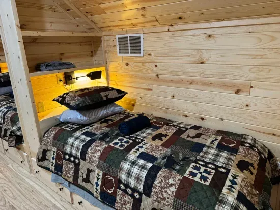 For those additional Guests and kids, the 2nd floor closed sleeping loft is a perfect space!!  Each of the 4 built-in twin beds has its own reading light, drawers for clothes storage, and a luggage rack for a suitcase or bag.