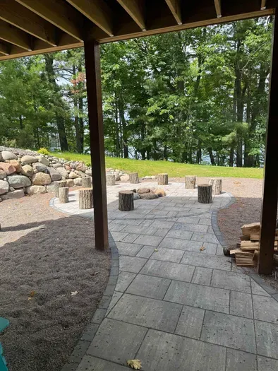 Lakeside #1 finished lower level walk out to fire pit area, private dock, & lake