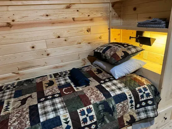 For those additional Guests and kids, the 2nd floor closed sleeping loft is a perfect space!!  Each of the 4 built-in twin beds has its own reading light, drawers for clothes storage, and a luggage rack for a suitcase or bag.