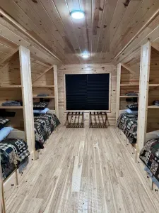 For those additional Guests and kids, the 2nd floor closed sleeping loft is a perfect space!!  Each of the 4 built-in twin beds has its own reading light, drawers for clothes storage, and a luggage rack for a suitcase or bag.