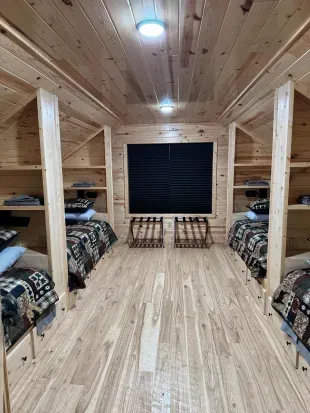 For those additional Guests and kids, the 2nd floor closed sleeping loft is a perfect space!!  Each of the 4 built-in twin beds has its own reading light, drawers for clothes storage, and a luggage rack for a suitcase or bag.