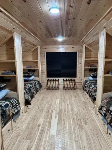 For those additional Guests and kids, the 2nd floor closed sleeping loft is a perfect space!!  Each of the 4 built-in twin beds has its own reading light, drawers for clothes storage, and a luggage rack for a suitcase or bag.