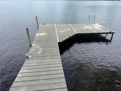 Lakeside #1 private swimming & boat dock.  Also best place to launch the provided kayaks or other water toys brought by Guests.
