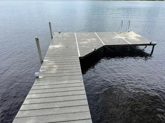 Lakeside #1 private swimming & boat dock.  Also best place to launch the provided kayaks or other water toys brought by Guests.