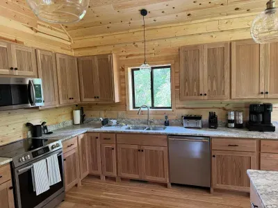 Kitchen within Lakeside #1 is well appointed with oven, microwave, dishwasher, farm sink, toaster oven, Keurig Coffee / Expresso maker, blender, and much more!!