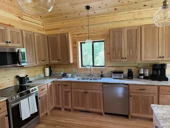 Kitchen within Lakeside #1 is well appointed with oven, microwave, dishwasher, farm sink, toaster oven, Keurig Coffee / Expresso maker, blender, and much more!!