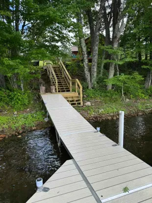 Lakeside #1 private swimming & boat dock.  Also best place to launch the provided kayaks or other water toys brought by Guests.