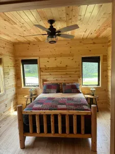 Main level Queen Bed, Bedroom #2 within Lakeside #1.  This bedroom connects directly with the main level full bathroom.