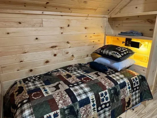 For those additional Guests and kids, the 2nd floor closed sleeping loft is a perfect space!!  Each of the 4 built-in twin beds has its own reading light, drawers for clothes storage, and a luggage rack for a suitcase or bag.