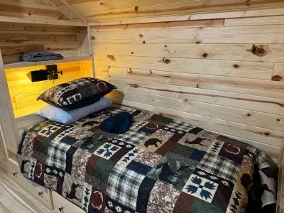 For those additional Guests and kids, the 2nd floor closed sleeping loft is a perfect space!!  Each of the 4 built-in twin beds has its own reading light, drawers for clothes storage, and a luggage rack for a suitcase or bag.