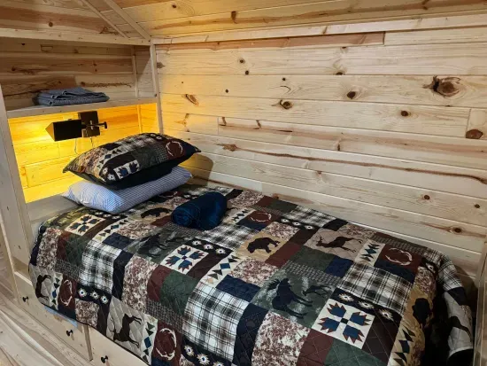 For those additional Guests and kids, the 2nd floor closed sleeping loft is a perfect space!!  Each of the 4 built-in twin beds has its own reading light, drawers for clothes storage, and a luggage rack for a suitcase or bag.