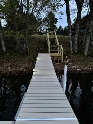 Lakeside #1 private swimming & boat dock.  Also best place to launch the provided kayaks or other water toys brought by Guests.