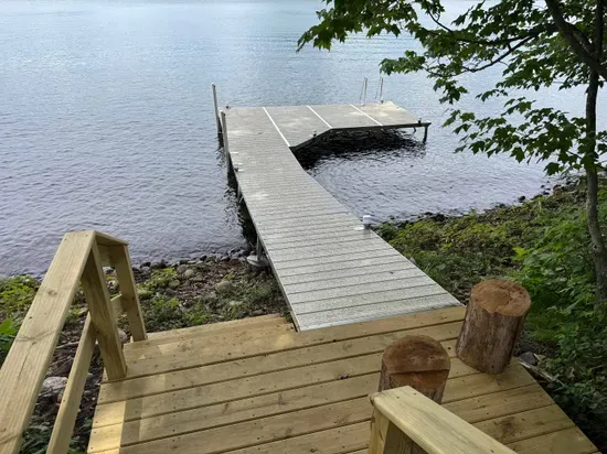 Lakeside #1 private swimming & boat dock.  Also best place to launch the provided kayaks or other water toys brought by Guests.