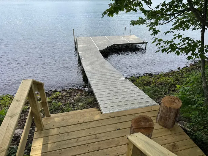 Lakeside #1 private swimming & boat dock.  Also best place to launch the provided kayaks or other water toys brought by Guests.