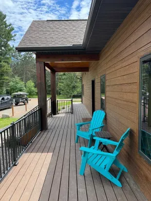 New build w/lake views from all levels! 3k+ sq.ft, 4bdrm / 3bath / twin beds (4) Sleeping Loft, ramp access, covered wrap-around deck, finished lower-level walk out to the fire-pit area and path to private boat dock, and views of sunrise and sunset.