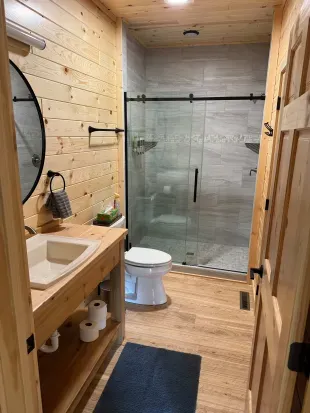 Main level full bathroom.that connects directly with bedroom #2 and also supports any Guests staying in the 2nd floor closed sleeping loft.
