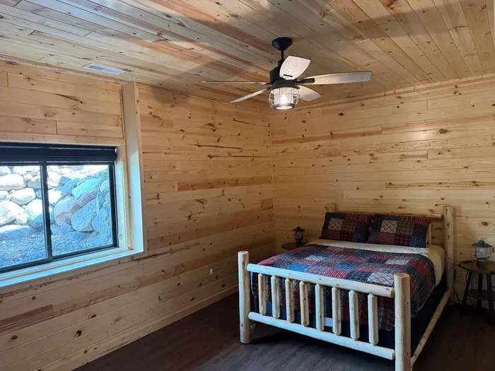 Lakeside #1 lower level Queen Bed, Bedroom #4 in the house, includes closet, night stands with plug in's for your phones, and space for pack n play, etc.