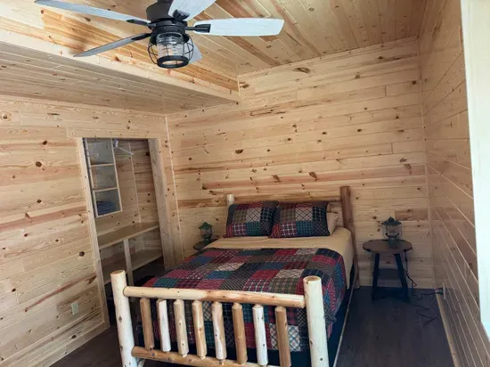 Lakeside #1 lower level Queen Bed, Bedroom #3 in the house, includes closet, night stands with plug in's for your phones, and space for pack n play, etc.