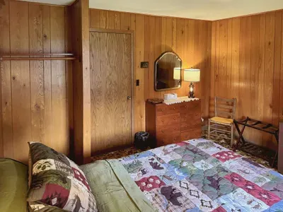 Bedroom #2 with Queen-Size Bed, Internet Connected Smart TV, Clothes Hanging Closet, Duo Suit Case Stands, Dresser w/Multi-Function Light Settings & Smart Device Outlets, Duo Night Stands w/Smart Device Outlets, & Black-Out Window Shades