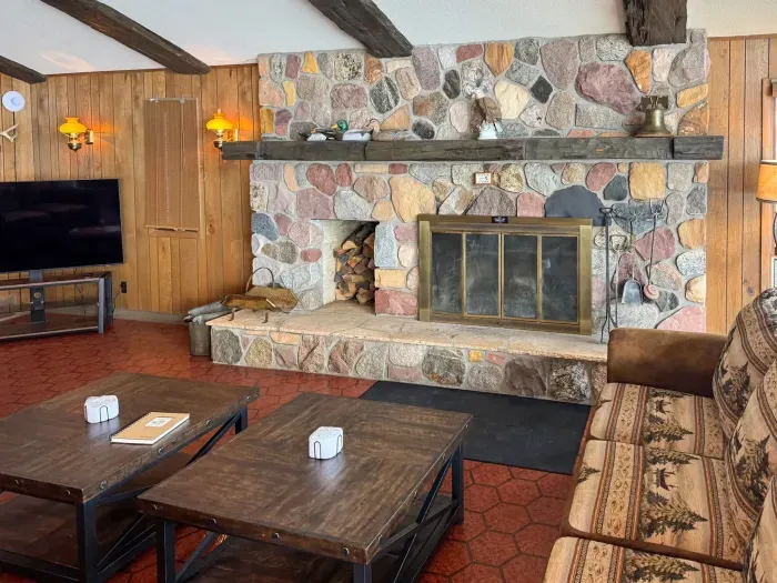 Fireplace and hearth within the 5RK Lodge great room.  The fireplace is functional but not for guest use at this time.  