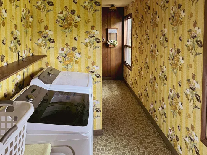 Located just inside the front entrance and accessible off the entry hallway, 5RK Ranch Lodge guests will find this large utility room equipped with large capacity washer & dryer, a deep sink, iron w/ironing board, and basic washer & dryer items