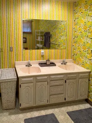 Spacious Family Size Bathroom #1 with towel set for 6 guests (hand towel, washcloth, shower towel), hamper, spa soaps (hand soap, shampoo, conditioner, bath gel), hair dryer, dual vanity with storage, ceiling heat vent, air vent, & much more!