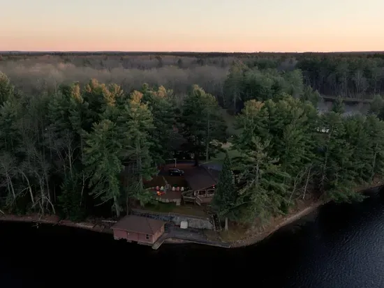 5RK Ranch Lakeside Lodge, Boathouse, Boat Dock (Up to 4 Boats), and 1000+ Ft of Private Sandy Beach and Swim Area..  The boat docs form a protective shallow swim area great for young kids.