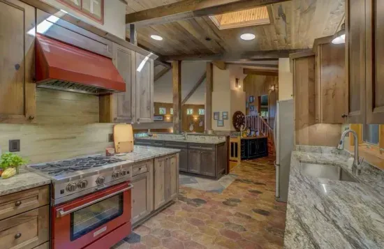 Updated and refreshed upscale kitchen and dining area with open views to the large great room / hearth room living area.