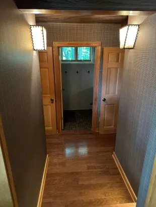 Top of stairway down to full bathroom #2 that conveniently sits between Queen Bed - Bedroom #2 and Queen Bed - Bedroom #3.  This full bathroom also supports the needs of any Guests staying in the lower level bunk room.
