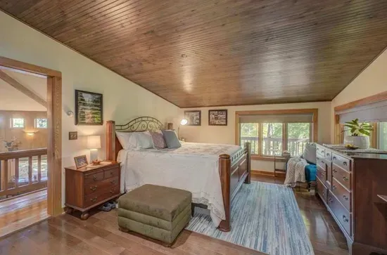 Newly renovated queen bed master bedroom lake view suite with dual vanity bathroom ensuite including custom oversized shower