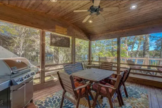 Large screened in porch off the lakeside viewing deck and sunroom off the kitchen.