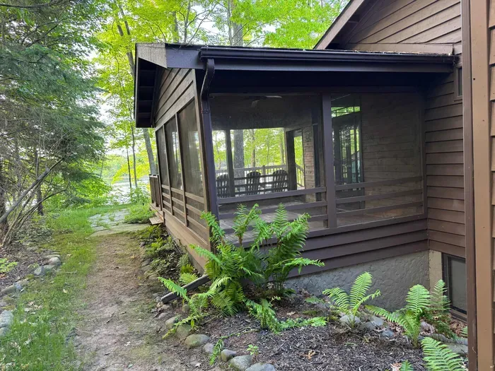 Large screened in porch off the lakeside viewing deck and sunroom off the kitchen.