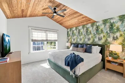 Sleep among the pines in this primary — no tent required.