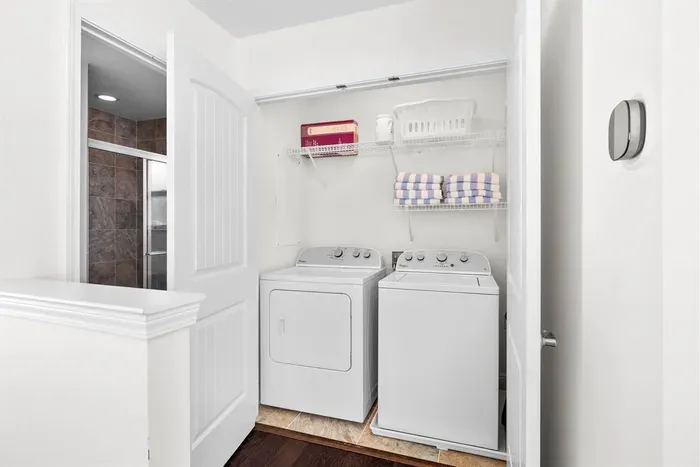 Laundry area with full size washer and dryer