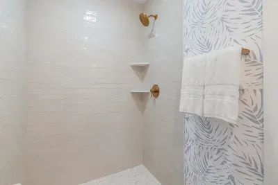 Primary Bathroom with Oversized Glass Shower and Vanity