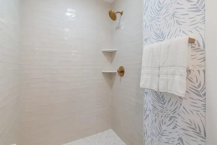 Primary Bathroom with Oversized Glass Shower and Vanity