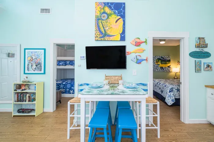 Fish and feathers! dining area is filled with fun artwork 