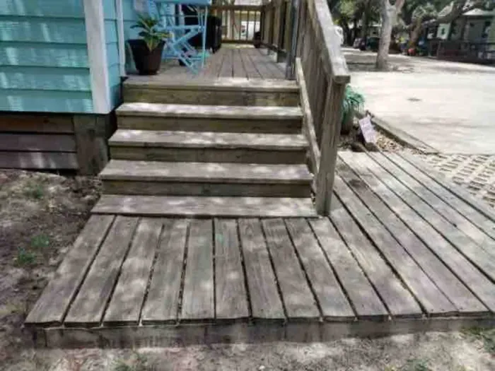 Guest must climb 4 steps to gain entrance. Stair rail is sturdy. There is a retractable mesh baby/ dog gate t block steps.