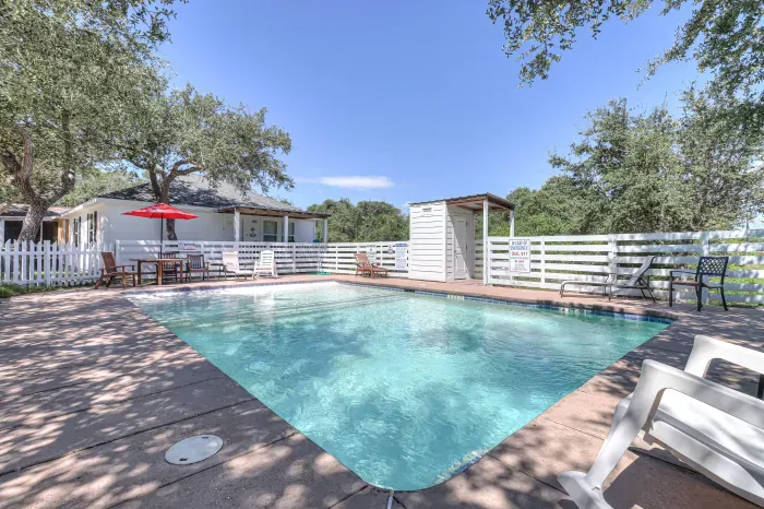 Beach entry pool making it fun for Littles to splash or Bigs to sit and sip without getting your hair wet. Poolside bathroom for convenience.