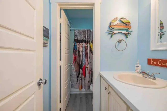 Toilet and shower room are separate from vanity area--allowing more than 1 person to get ready at a time