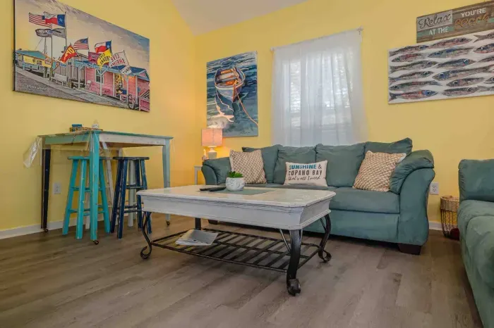 It's the details that count! Our dining table is on castors which allows it to be moved from the wall.  Basket of sofa covers to protect sofas from dirty paws and sticky fingers--helping bigs to worry less about the mess and focus on a good time