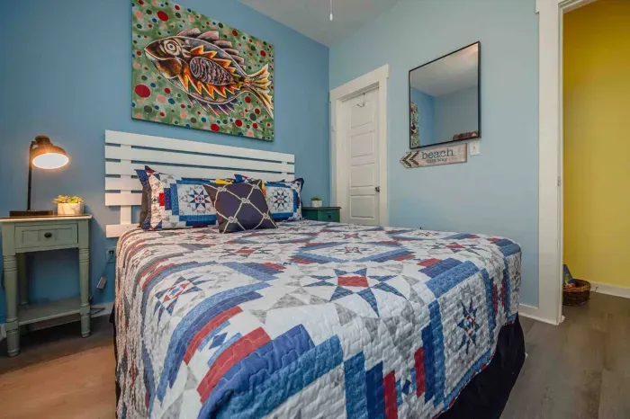 Original art compliments the queen bedroom.  Bed is nice and cozy. Extra blankets and pillows in the closet.