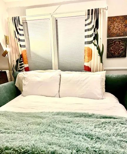 Queen sleeper sofa with a foam topper and fluffy cotton topper make this sofabed feel as good as any other mattress!