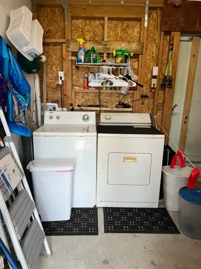Washer and dryer available in workroom, where you will also find a few life jackets, some fishing buckets and nets and beach chairs.